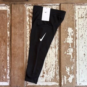 Nike Kids Black Athletic Joggers with White Swoosh Logo
size boys 4